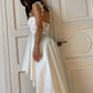 High-low wedding dress with crystal embellishments