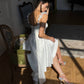 High-low wedding dress with crystal embellishments