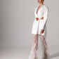 Bridal blazer dress with cutouts and an open-back design for a bold wedding look