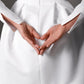 Chic baby doll wedding dress with a fitted bodice, puffed sleeves, and a feminine silhouette