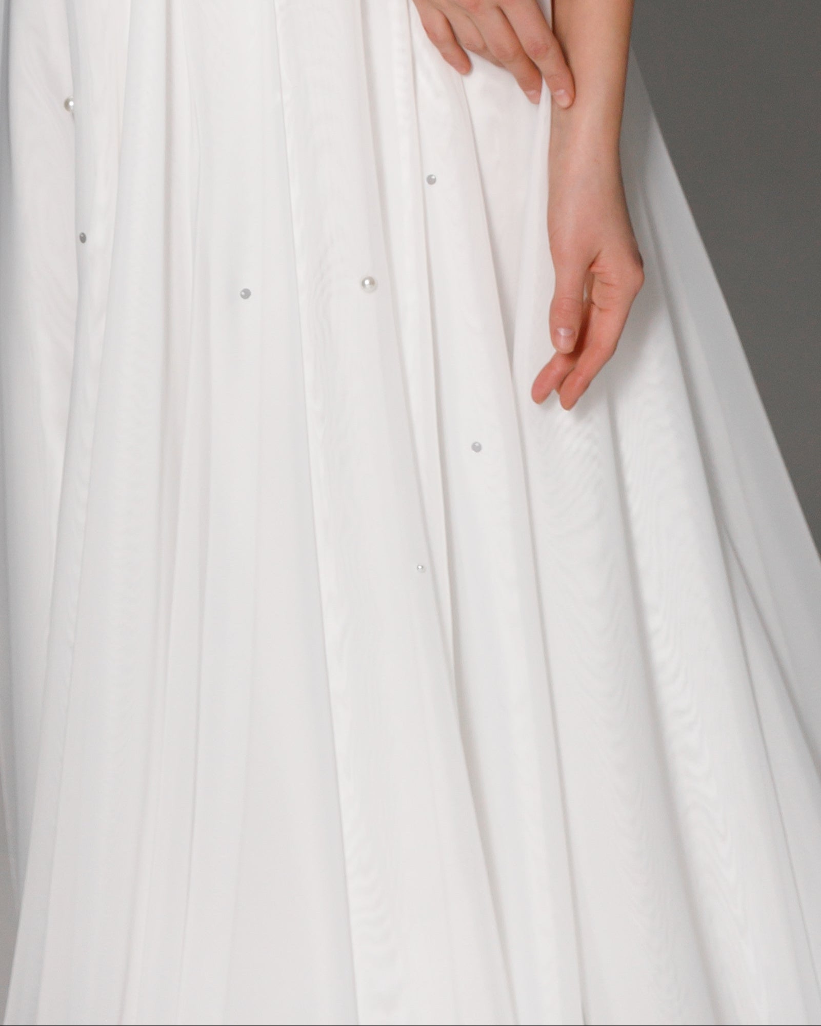 Ethereal A-line wedding dress crafted from airy organza for a graceful bridal look