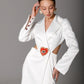 Modern blazer wedding dress with lace pants and a structured silhouette