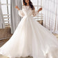 Romantic two-layer wedding gown featuring a satin slip dress and matte organza overlay