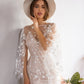 Unique celestial bridal dress with shimmering star embroidery on soft tulle